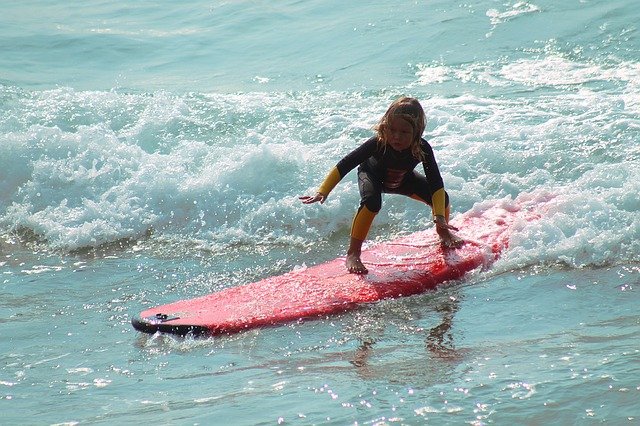 Kid Surfing